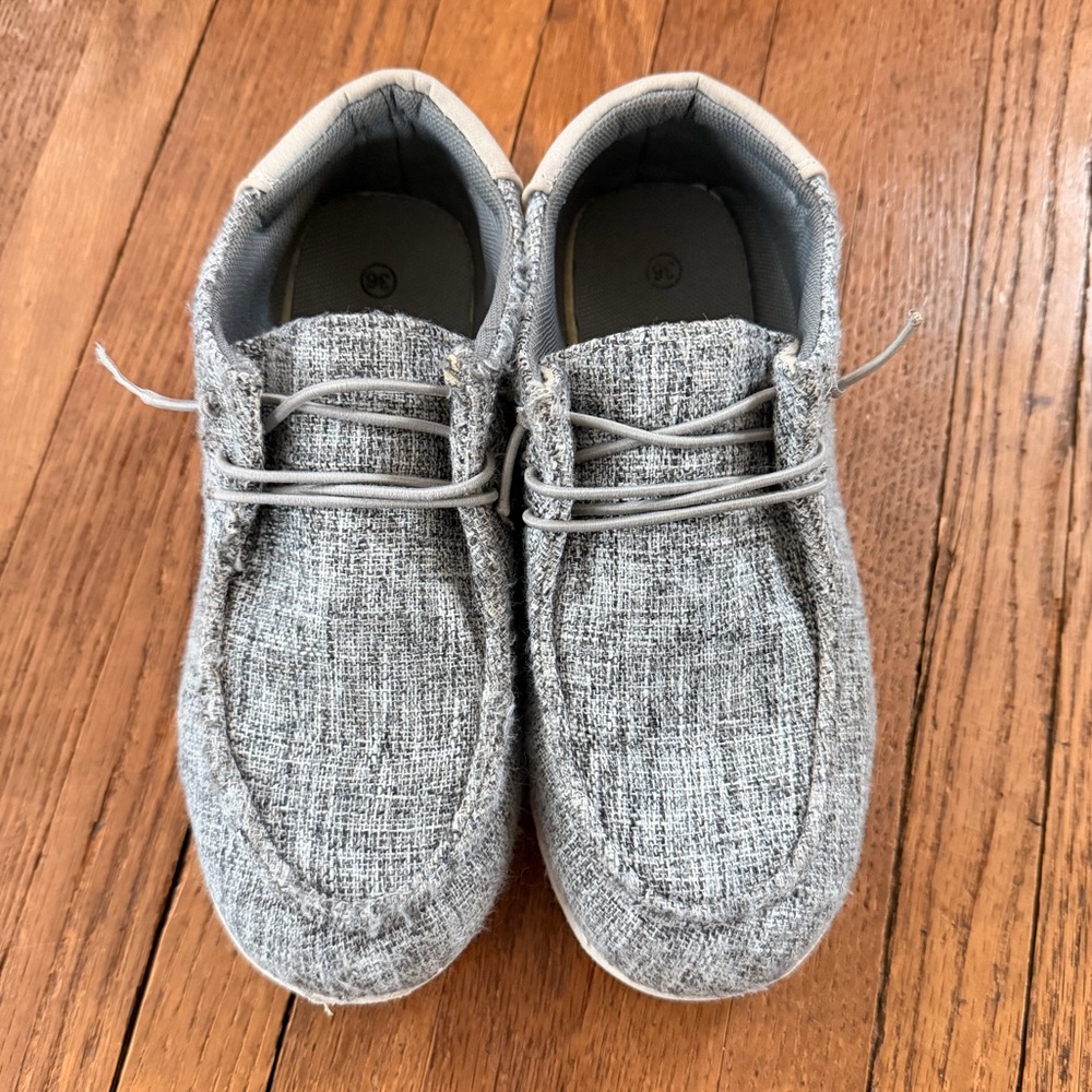 Gray slip on shoes. Boy or girl.